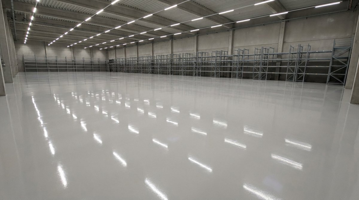 Illustrative image of a glossy epoxy floor, not a completed project